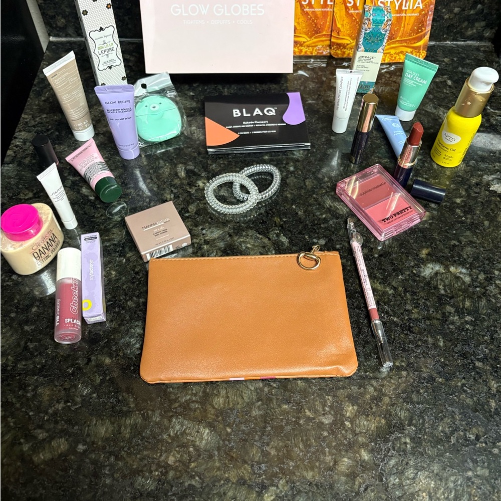 NWOT Mystery Faux leather Pouch with Assorted Beauty Products